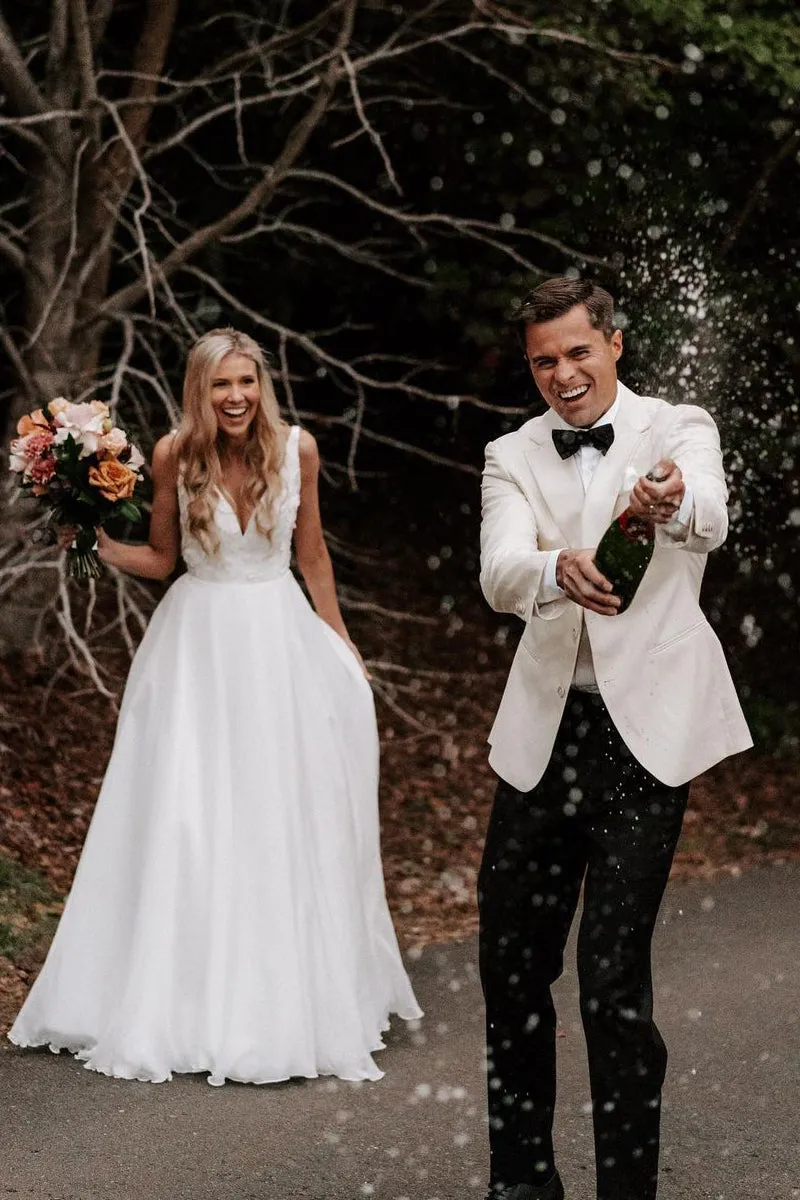 Zuri | Elegant A-Line V Neck White Chiffon Wedding Dress with Appliques sold by KissProm product image thumbnail 2