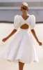 Elegant Bateau A Line Satin Knee-length Wedding Dress sold by KissProm