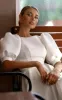 Elegant Bateau A Line Satin Knee-length Wedding Dress sold by KissProm
