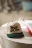 Hazel & Olive Two Toned Snapback Hat - Beige and Green sold by Hazel & Olive