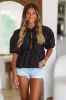 Peek-A-Bow Top - Black sold by Hazel & Olive