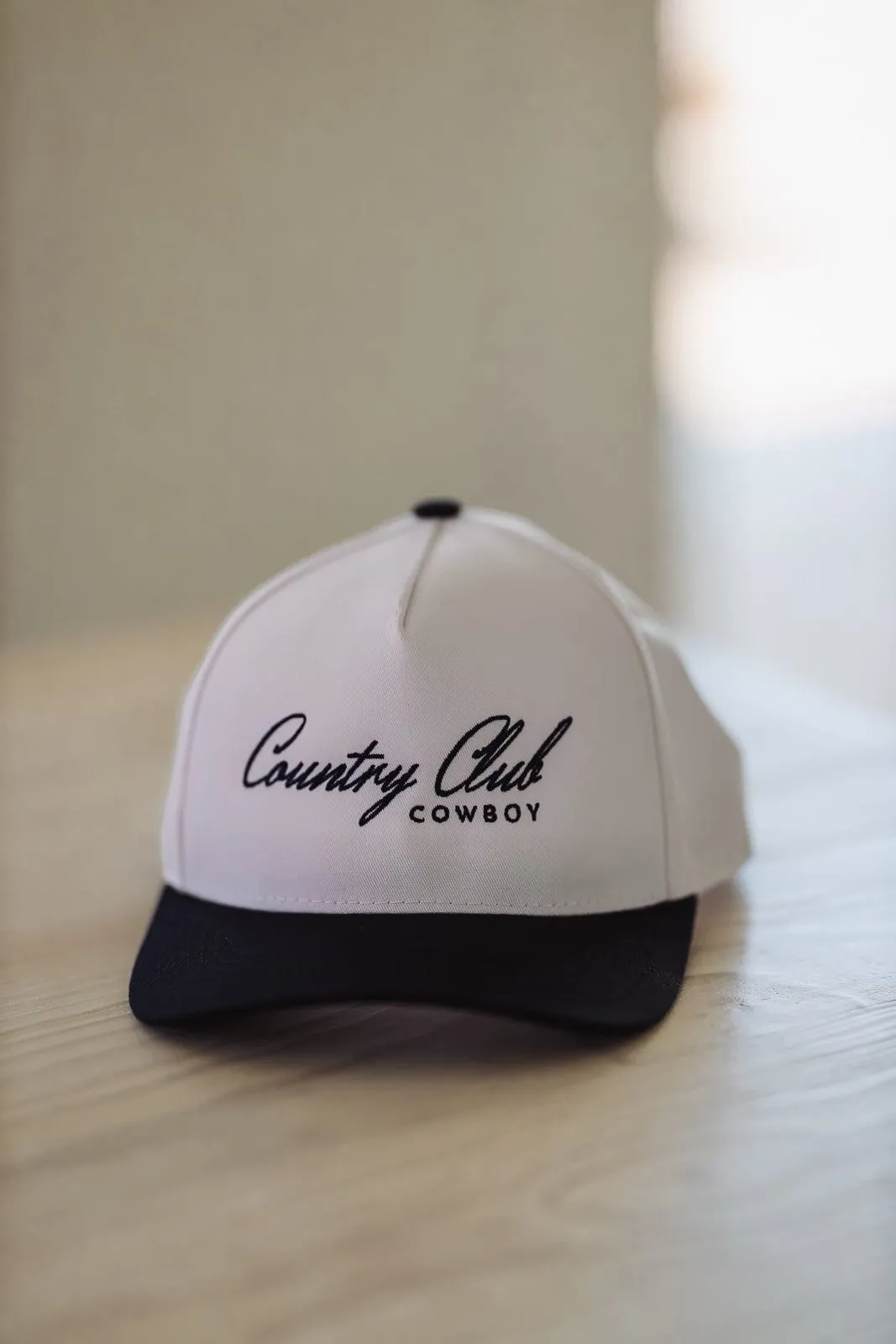 Country Club Cowboy Cap - White and Navy sold by Hazel & Olive