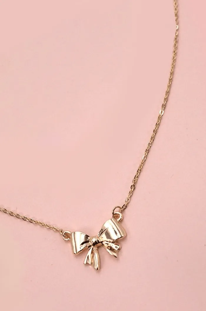 Mini Bow Necklace - Gold sold by Hazel & Olive