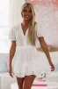 Here Comes the Sun Ruffled Mini Dress - White sold by Hazel & Olive