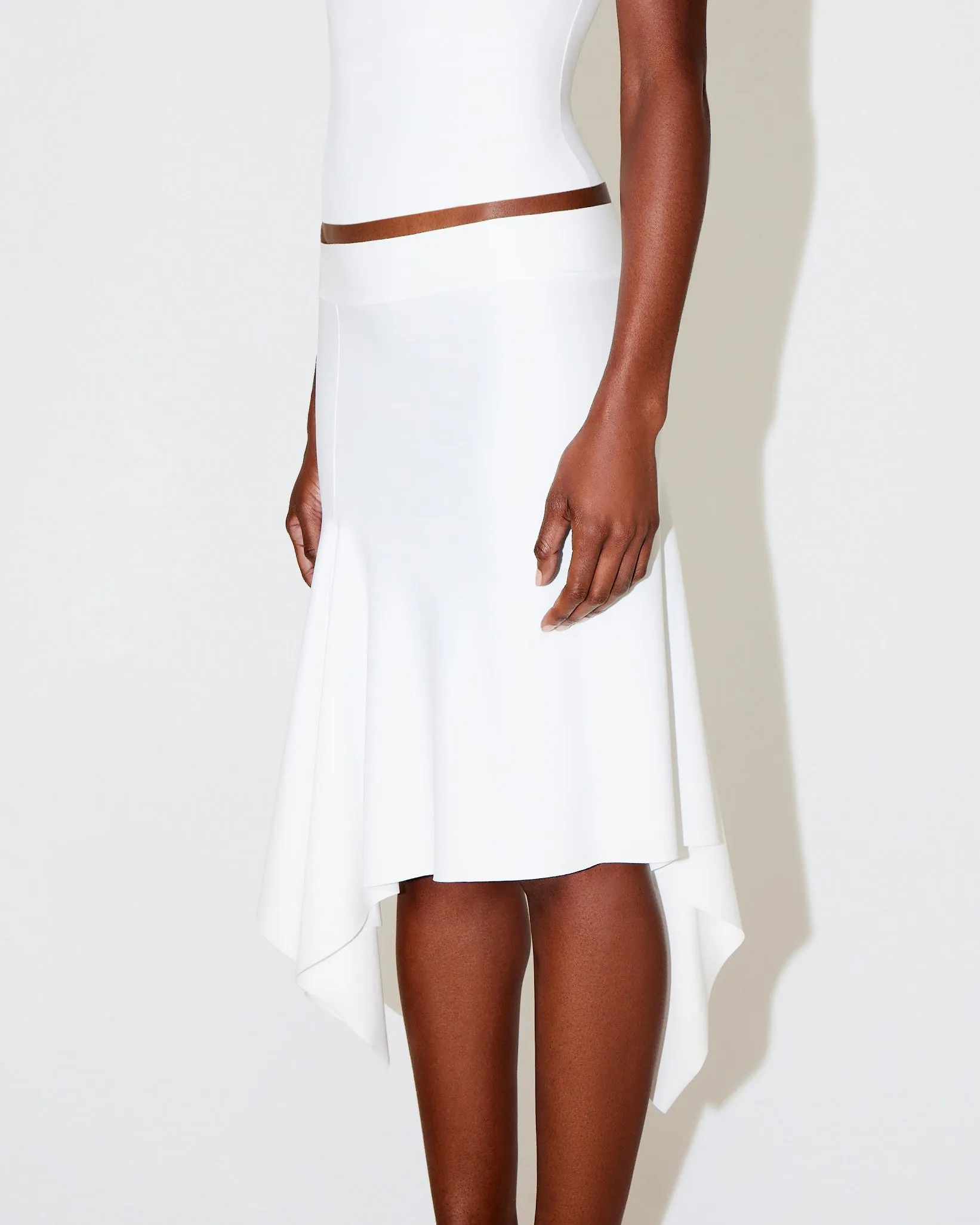 Sleek Stretch Asymmetrical Skirt | Bright White sold by KHY product image thumbnail 5