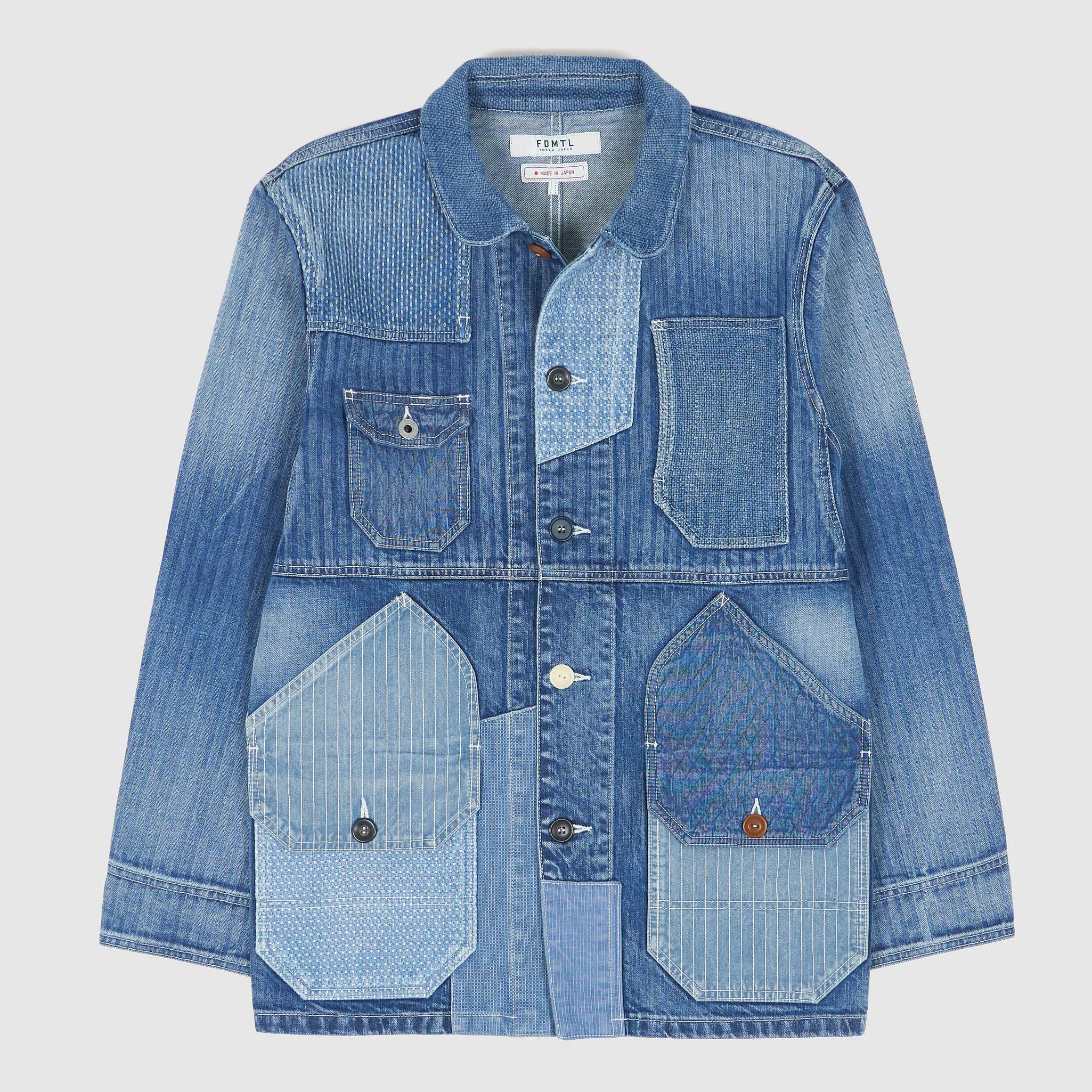 FDMTL Sashiko Indigo Patchwork Coverall Jacket sold by DeeCee style