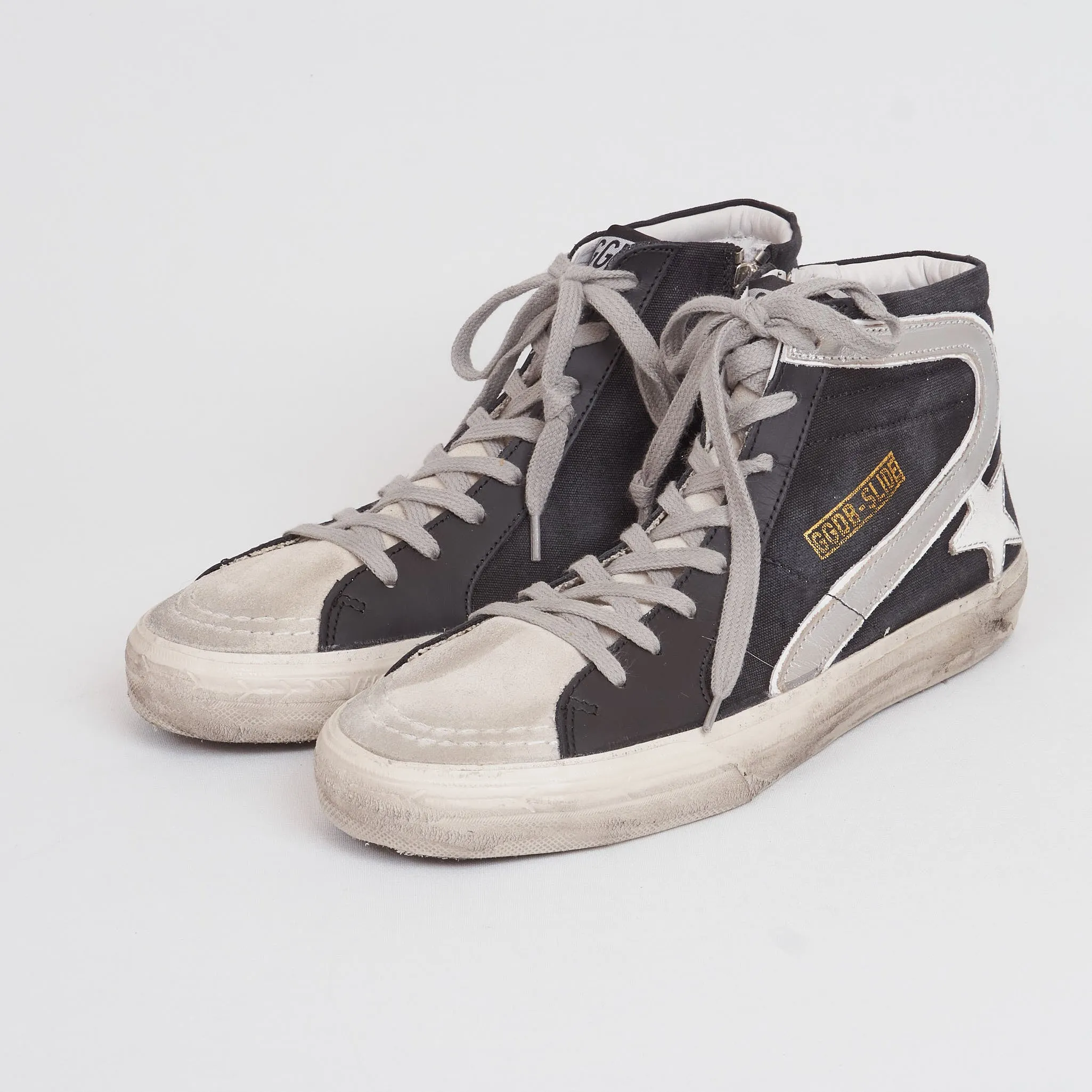 Golden Goose High Black Canvas Silver Slide Sneakers sold by DeeCee style