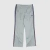 Needles Japan Straight Smooth Track Pants sold by DeeCee style