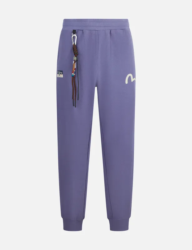Totem Daruma Print Straight Fit Sweatpants sold by Evisu