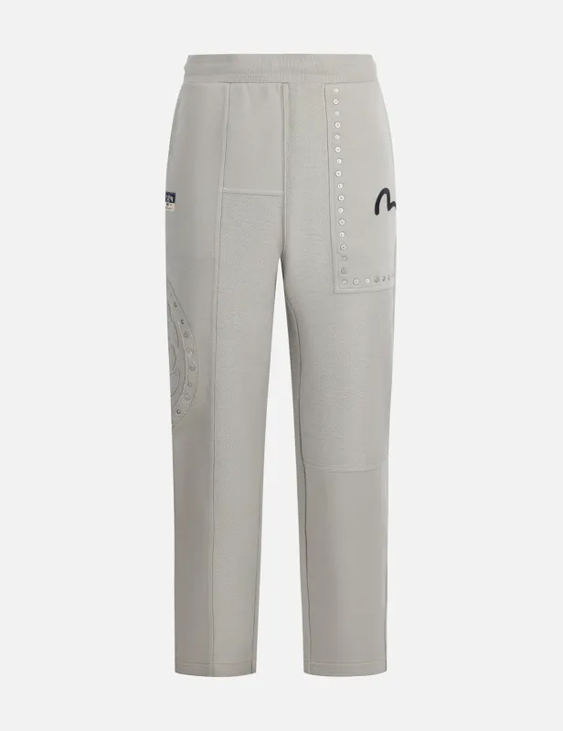 Kamon Appliqué and Fabric Blocking Fashion Fit Sweatpants sold by Evisu