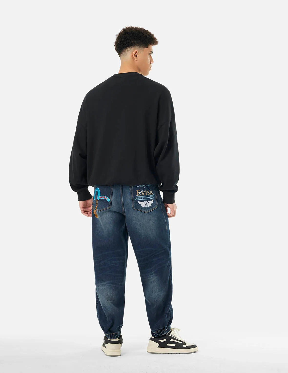 Multi-designed Pattern Baggy Denim Joggers sold by Evisu