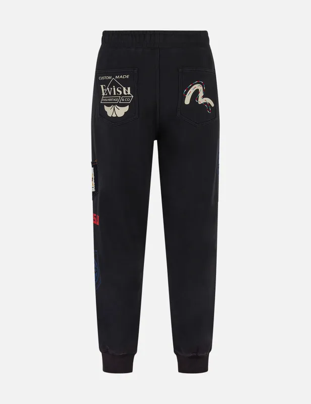 Washed Multi-pocket and Logos Print Straight Fit Sweatpants sold by Evisu