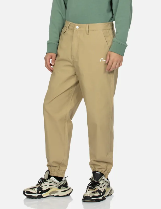Seagull Embroidery Relax Fit Woven Joggers sold by Evisu