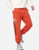 Kamon and Logo Print Sweatpants sold by Evisu