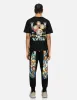 Daruma Daicock Print Regular Fit Sweatpants sold by Evisu