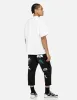 Multi-pocket and Multi-print Cropped-Fit Jeans #2027 sold by Evisu
