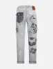 Multi-Pocket Carrot Fit Denim Jeans #2017 sold by Evisu