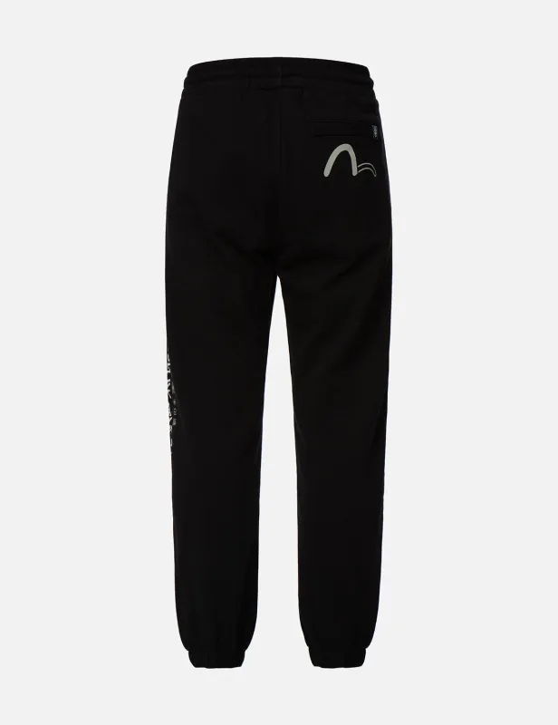 Logo and Slogan Print Sweatpants sold by Evisu