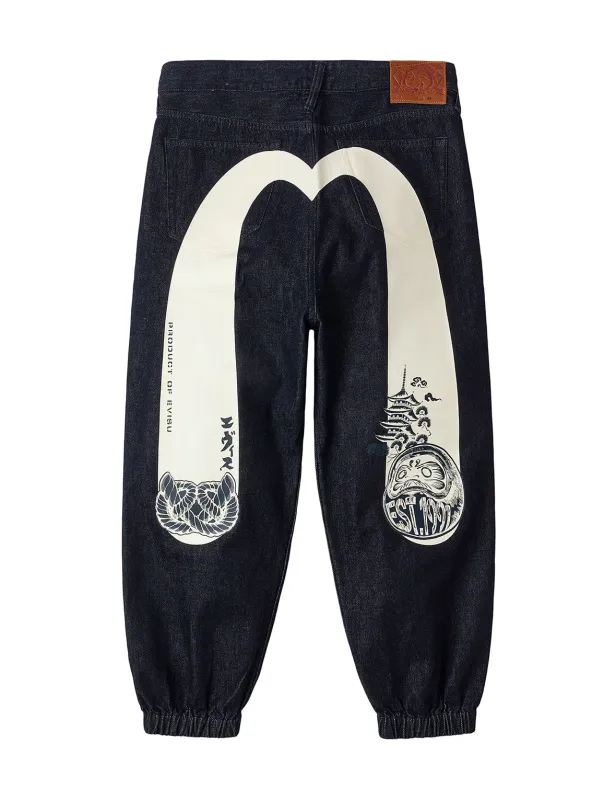 Daruma and Wheel of Wisdom Daicock Print Loose Fit Denim Joggers sold by Evisu