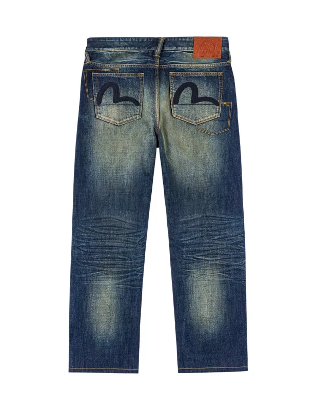 Dark Tone Washed Embroidery Jeans #2020 sold by Evisu