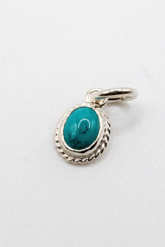 First Arrow's P-297 Turquoise Head - Small Pendant sold by Franklin and Poe
