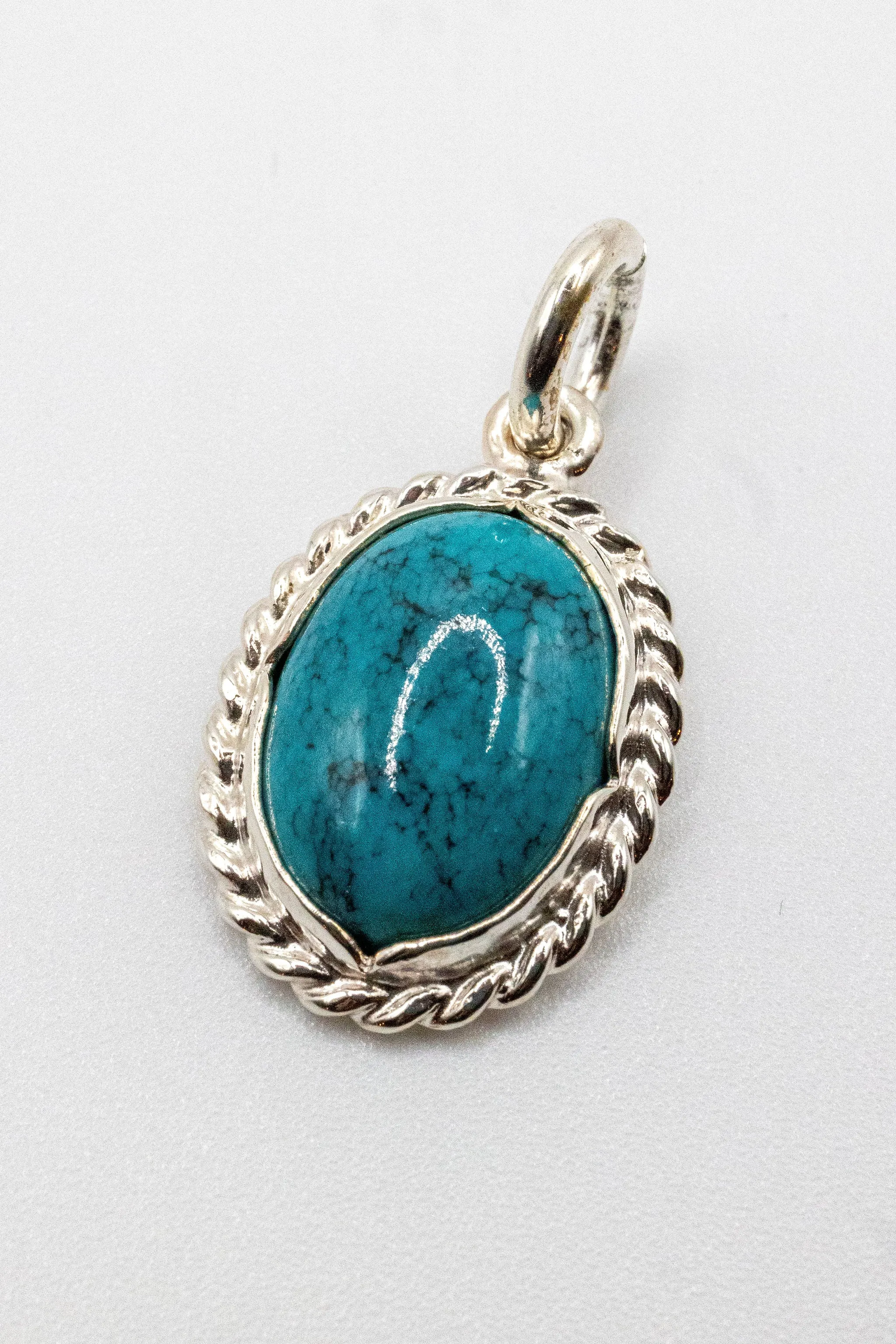 First Arrows P-201 Turquoise head - Pendant sold by Franklin and Poe