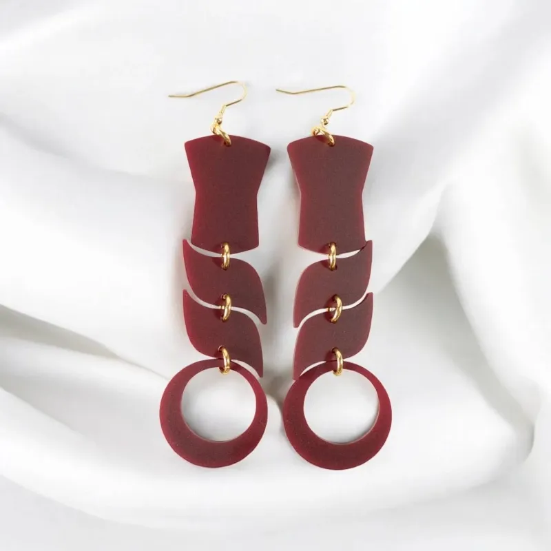 Copper Canoe Woman Spirit Flow Earrings Maroon sold by Ginew