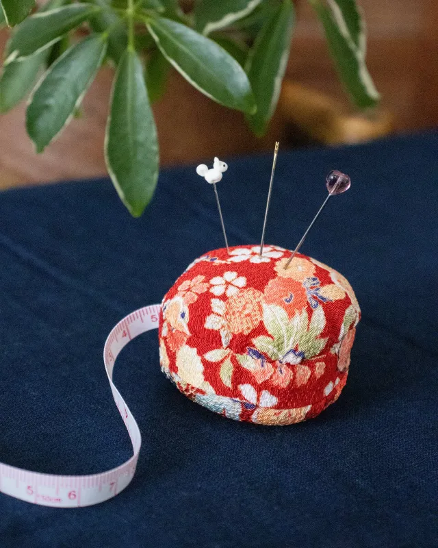 Hiro, Macaron Measure Pin Cushion, Red and Flowers sold by Kiriko