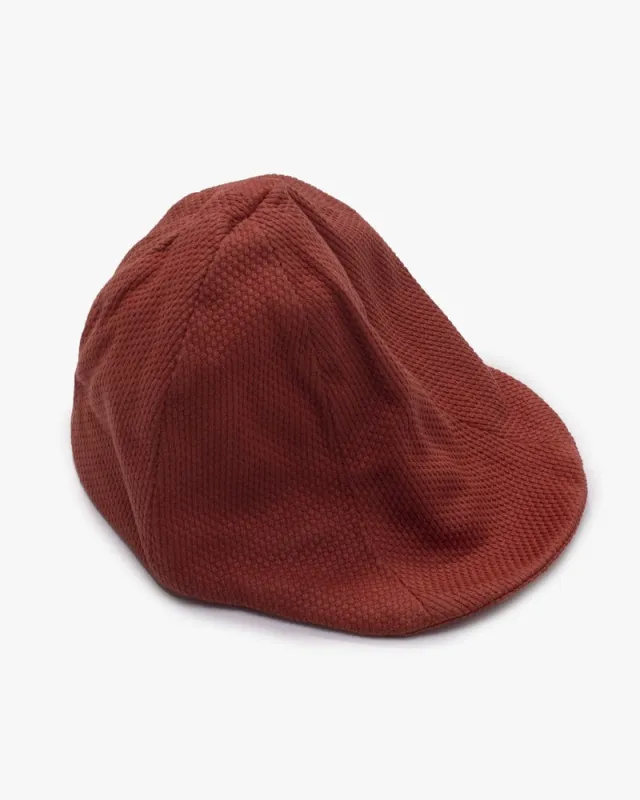 Prospective Flow Suna Cap, Rust sold by Kiriko