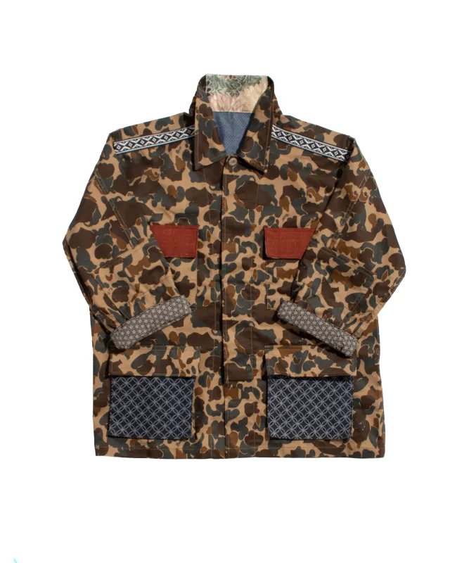 Kiriko Custom Military Jacket, Camo Patched, Crane and Chrysanthemum Obi with Hishi Webbing, Shippou, Asanoha, and Rust Pocket Flaps sold by Kiriko