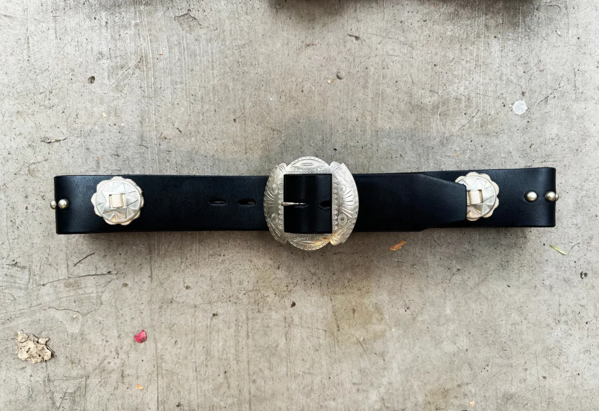 Nickel plated brass concho belt custom made by HTC sold by Left Field