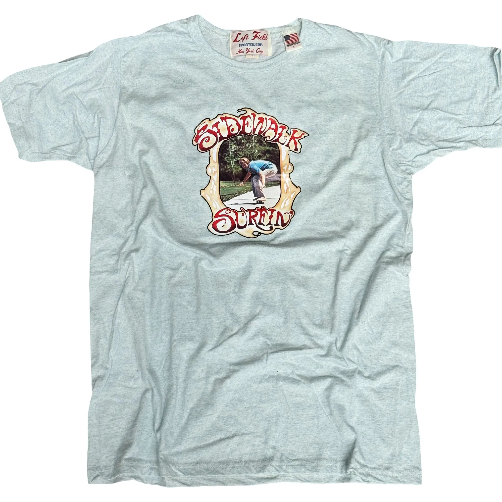Sidewalk Surfin Roachdesert sky heather cotton crew Ttee sold by Left Field
