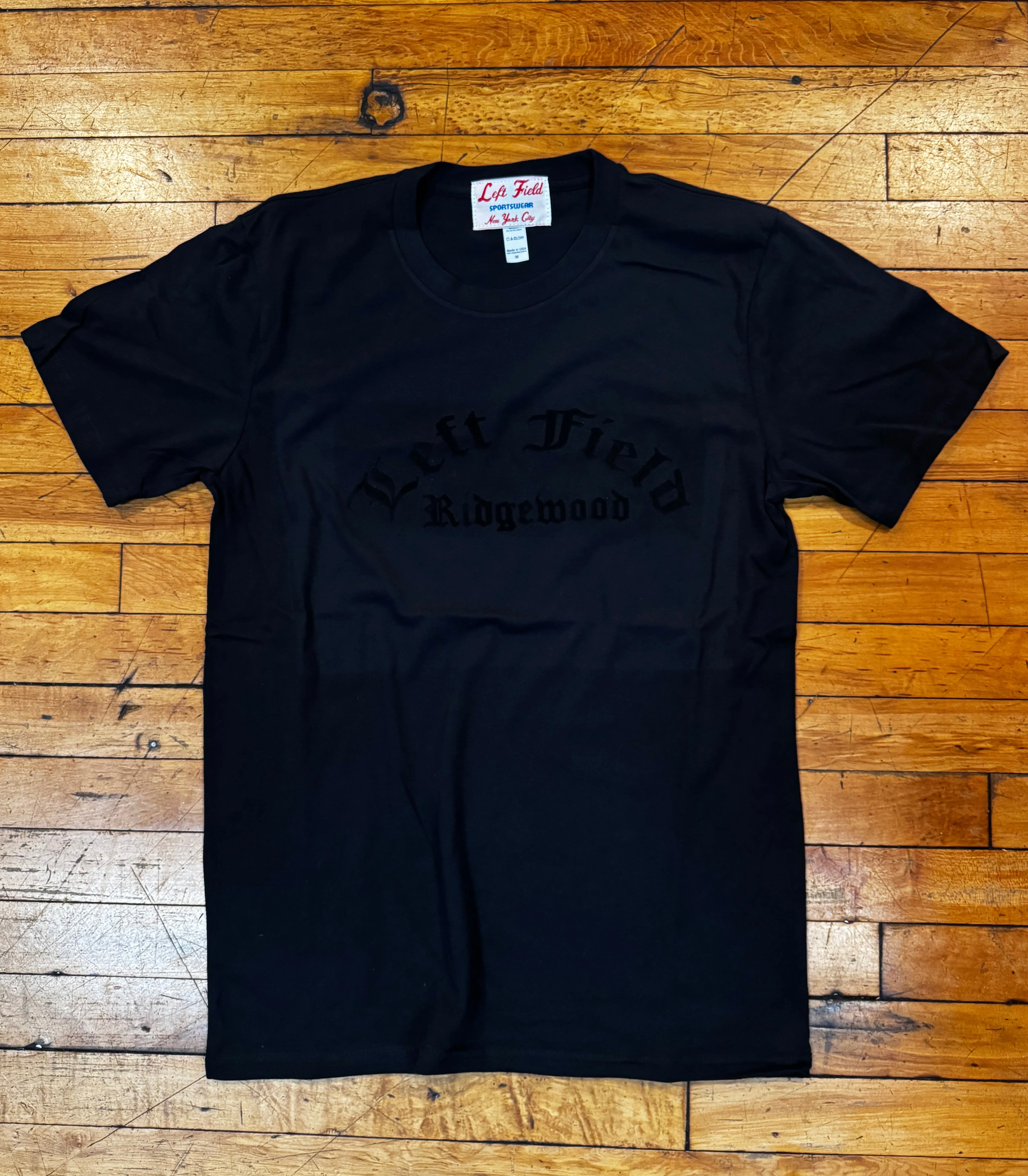 Flock Ridgewood Black Tee sold by Left Field