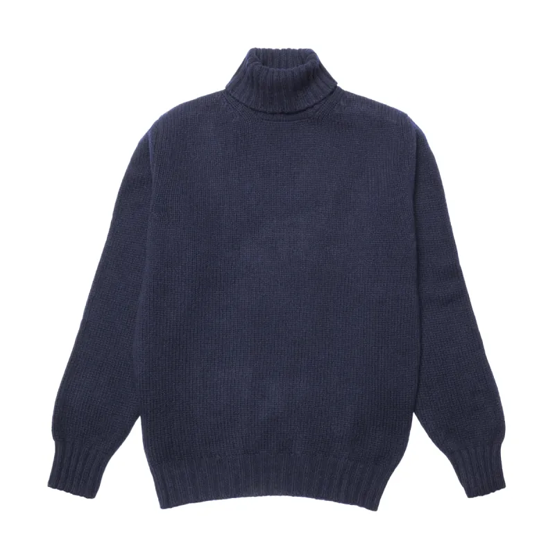 Navy Newman Lambswool Roll Neck Jumper sold by Malloch’s