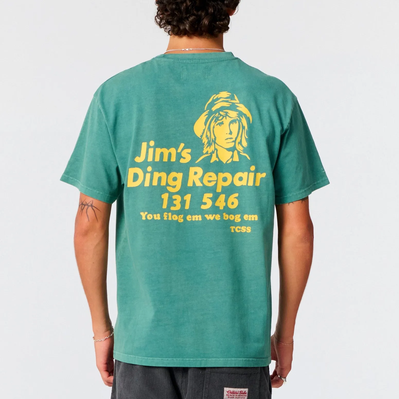 Jim's Ding Repair Tee | Dusty Green | Critical Slide sold by Man Ready