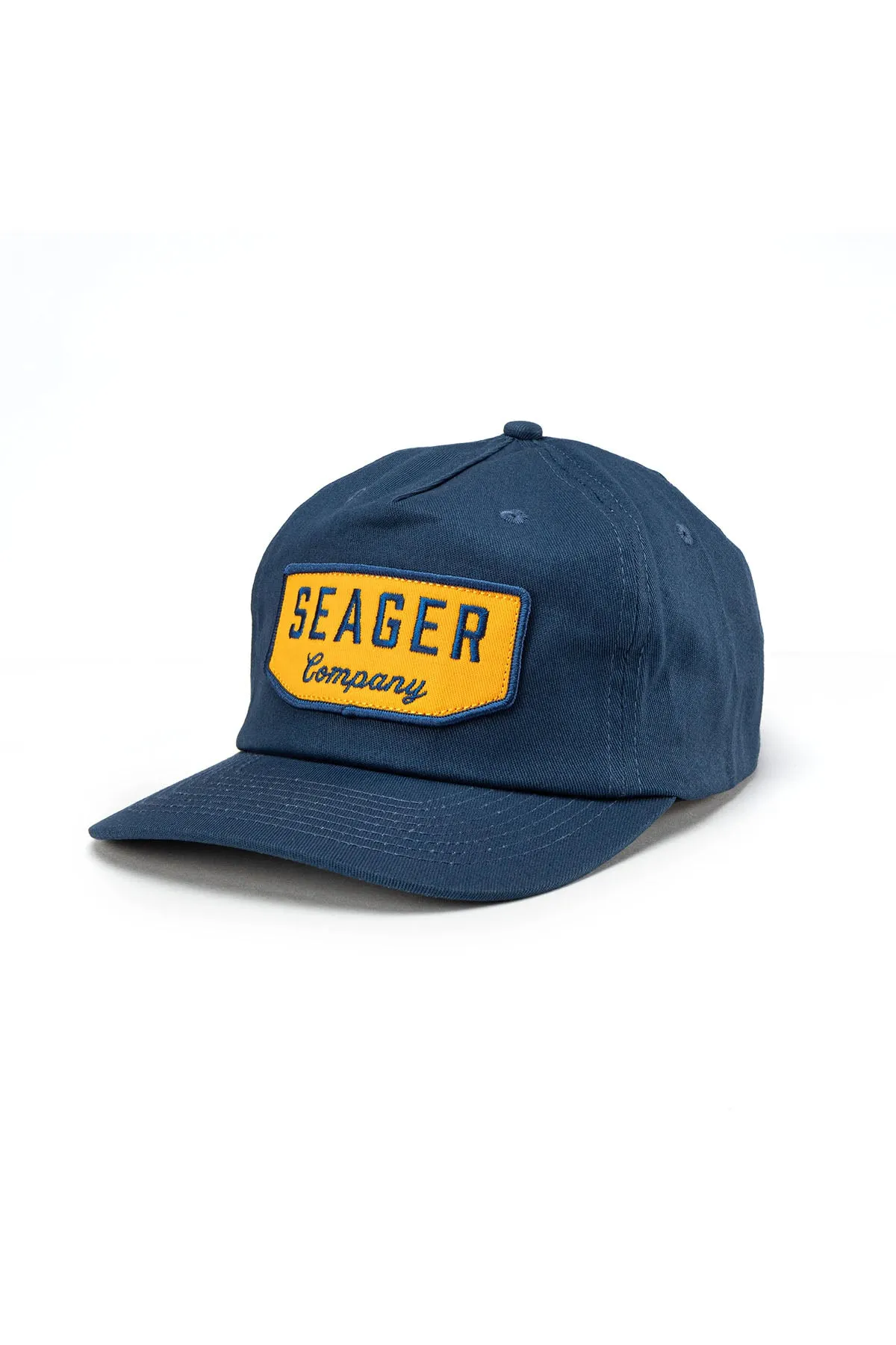WILSON SNAPBACK Navy sold by REVOLVR Menswear