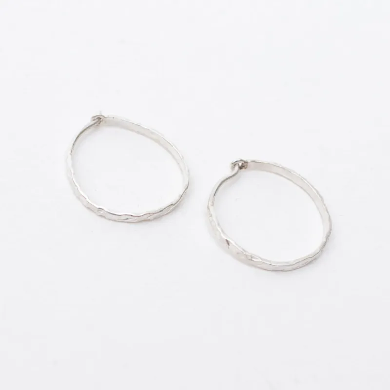 Hammered Silver Small Wire Hoops sold by Silver Lotus