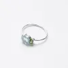 Silver Chalcedony and Peridot Faceted Three Stone Ring sold by Silver Lotus