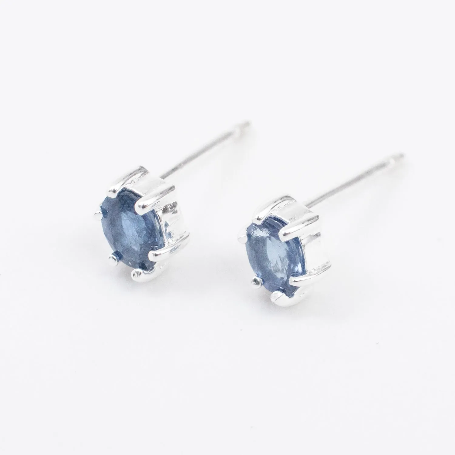 Silver Oval Blue Sapphire Claw Shaped Studs sold by Silver Lotus