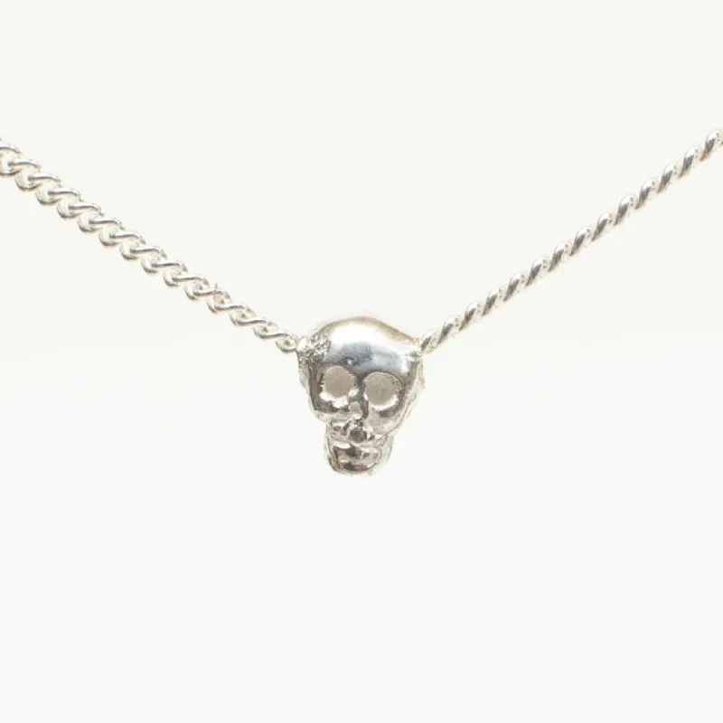 Extra Small Silver Skull Necklace sold by Silver Lotus