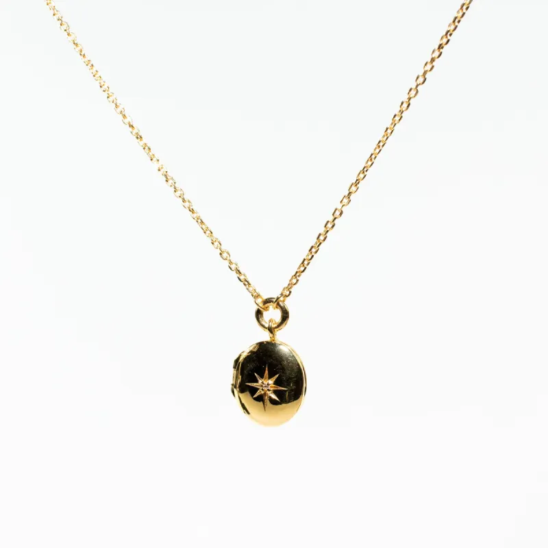 Oval Star Set Gold Vermeil Locket with White Sapphire sold by Silver Lotus