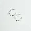 Twirled Small Silver Hoops sold by Silver Lotus