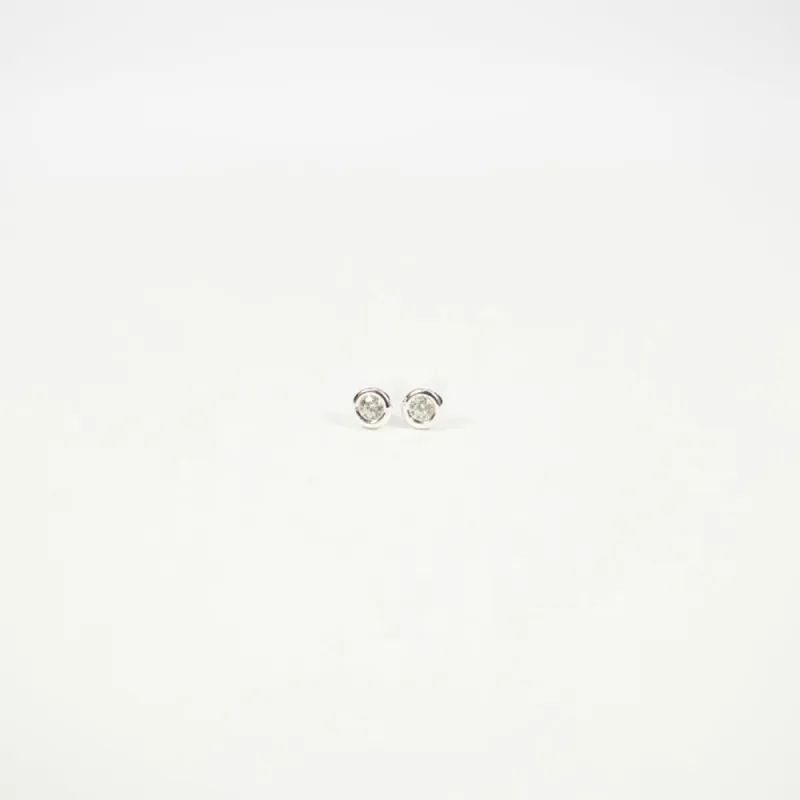 Tiny Round Cubic Zirconia Silver Studs sold by Silver Lotus
