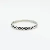 Thin Oxidized Silver Scroll Ring sold by Silver Lotus
