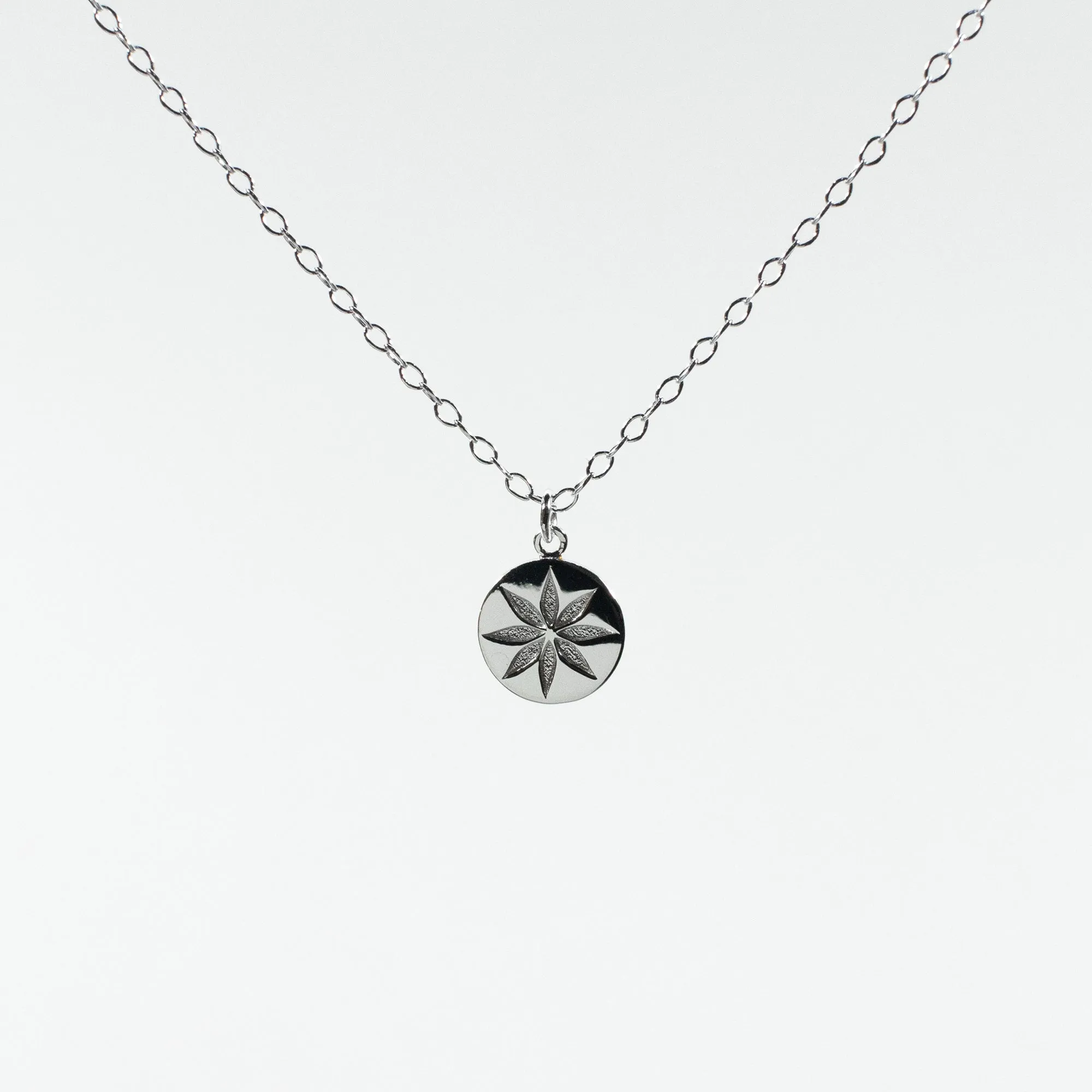 Silver Flower Disc Necklace sold by Silver Lotus
