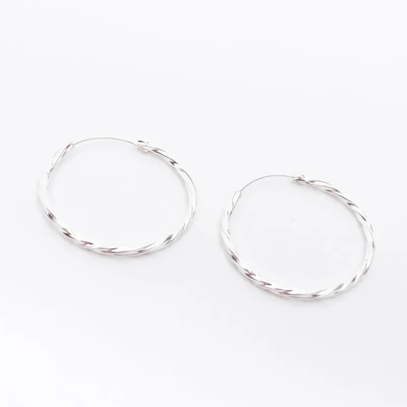 Twisted Silver Hoops sold by Silver Lotus