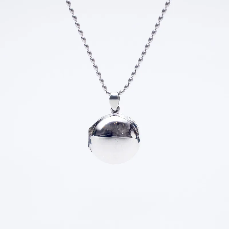 Medium Silver Round Locket sold by Silver Lotus