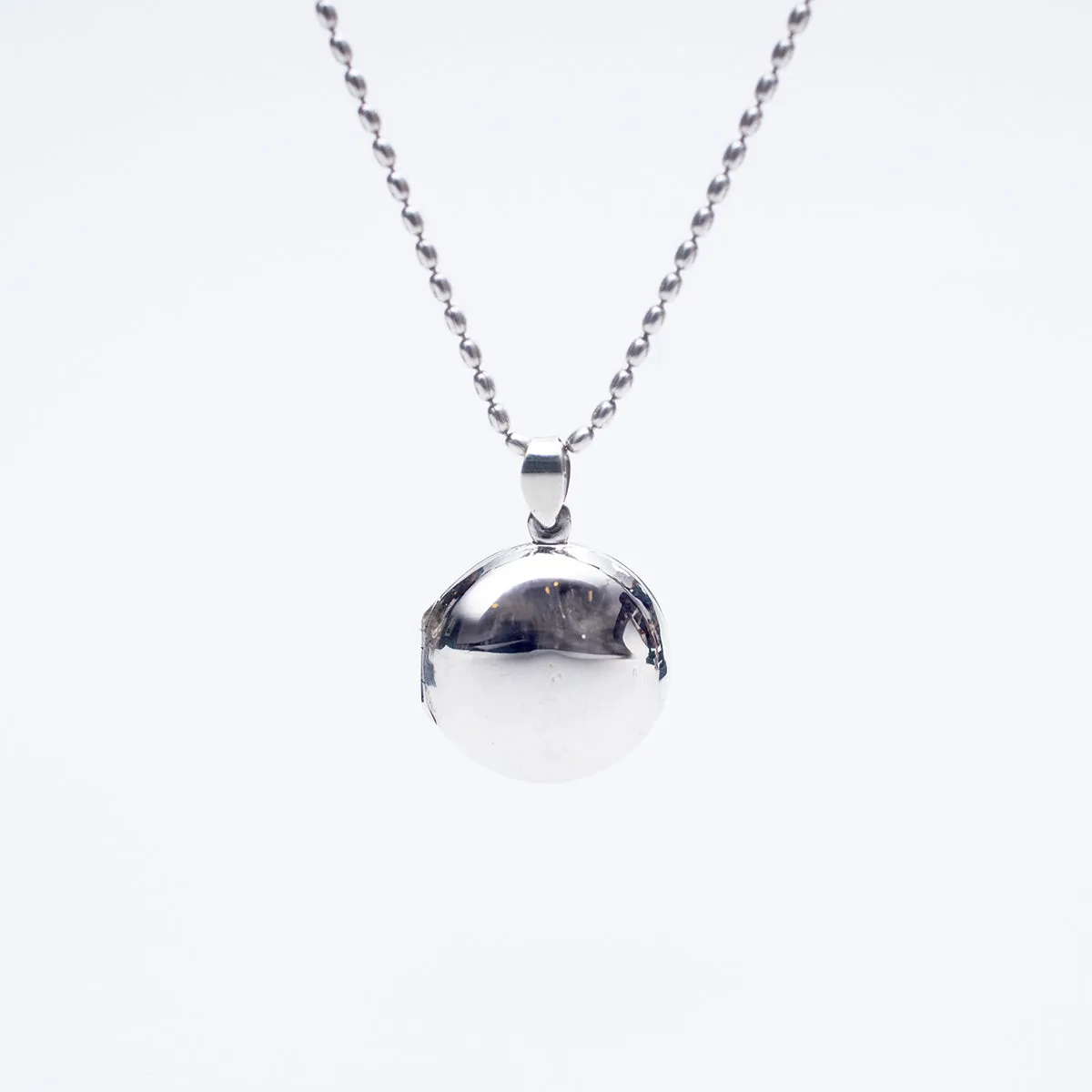 Medium Silver Round Locket sold by Silver Lotus