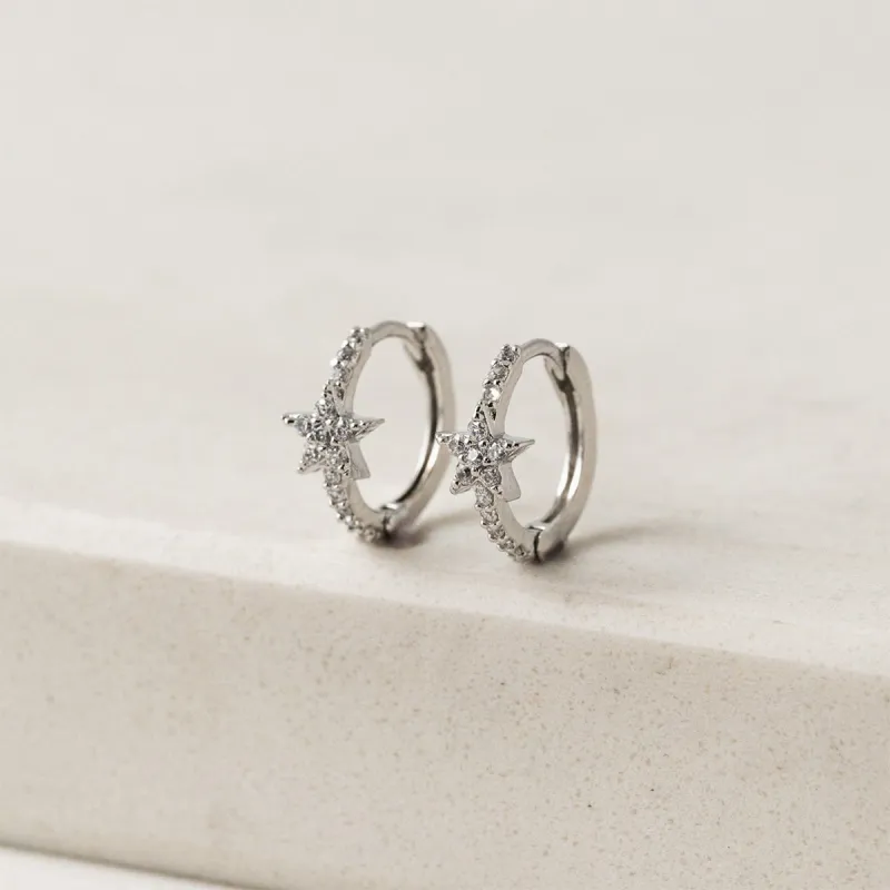 Silver Cosmos Star Huggie Hoop Earrings sold by Silver Lotus