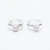 Silver Claw Set Pearl Hoops sold by Silver Lotus